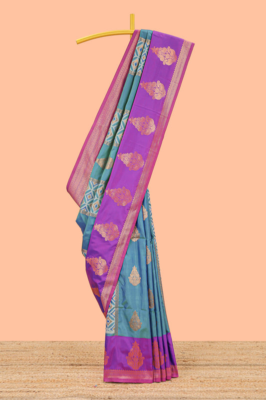 Green semi soft silk with striped pochampally ikkat design and contrast zari border