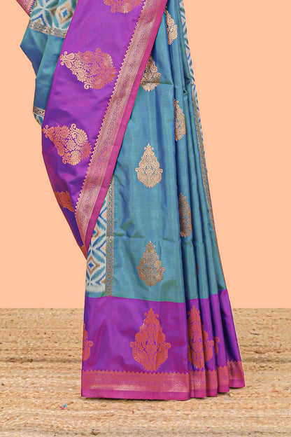 Green semi soft silk with striped pochampally ikkat design and contrast zari border