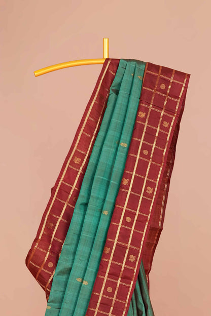 
Teal maroon pure silk saree