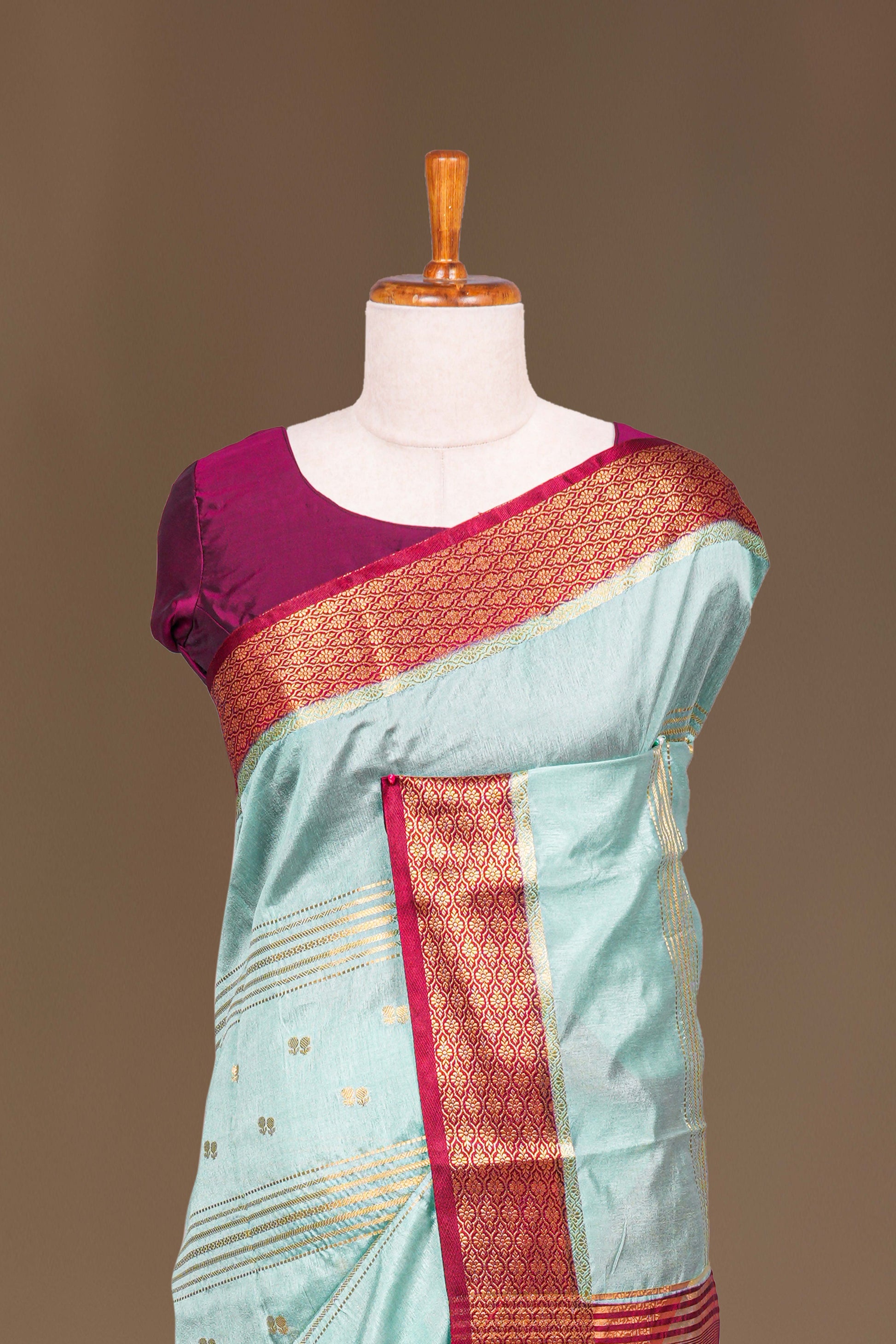 Teal raw silk intricate pallu saree