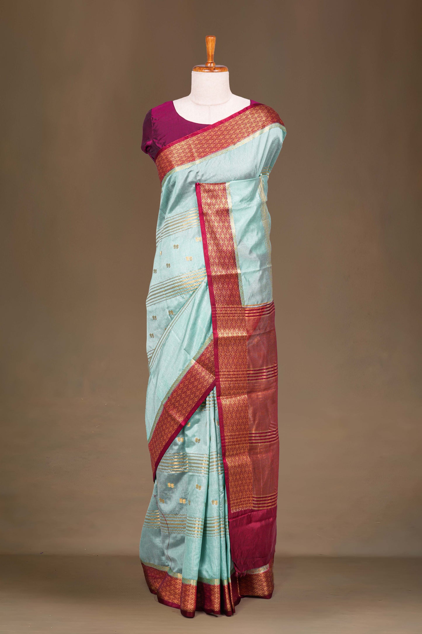 Teal raw silk woven border saree