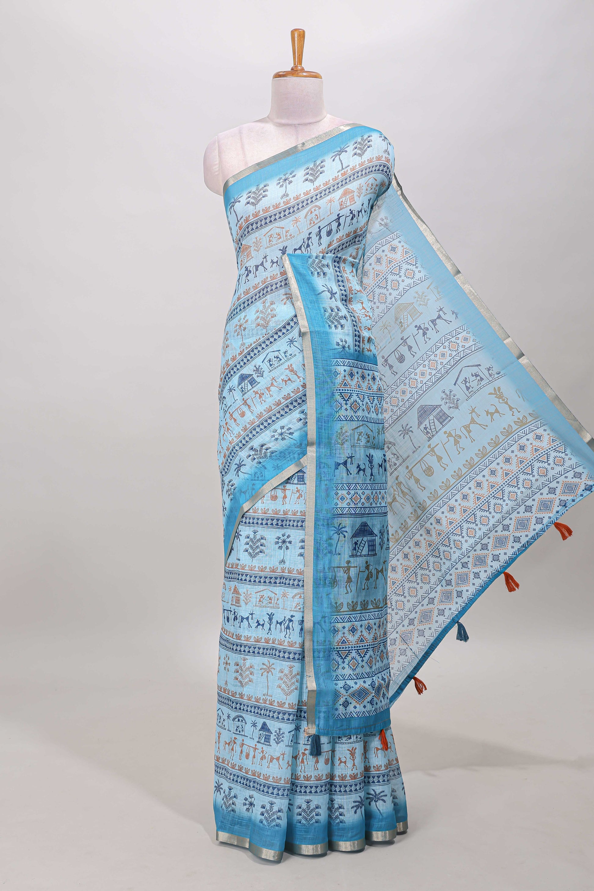 Turquoise blue warli print linen cotton saree