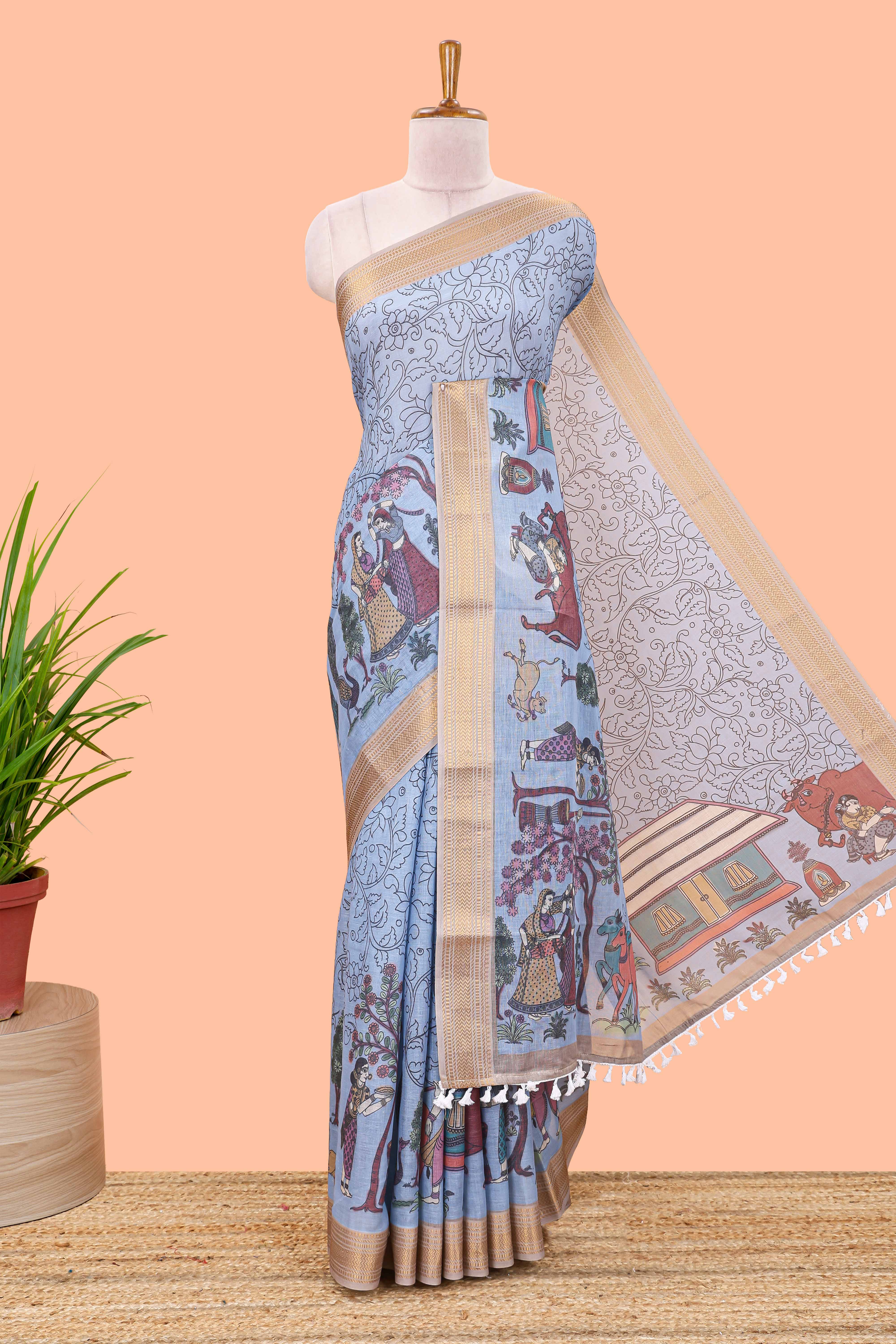Turquoise floral print Chirala cotton saree with zari border