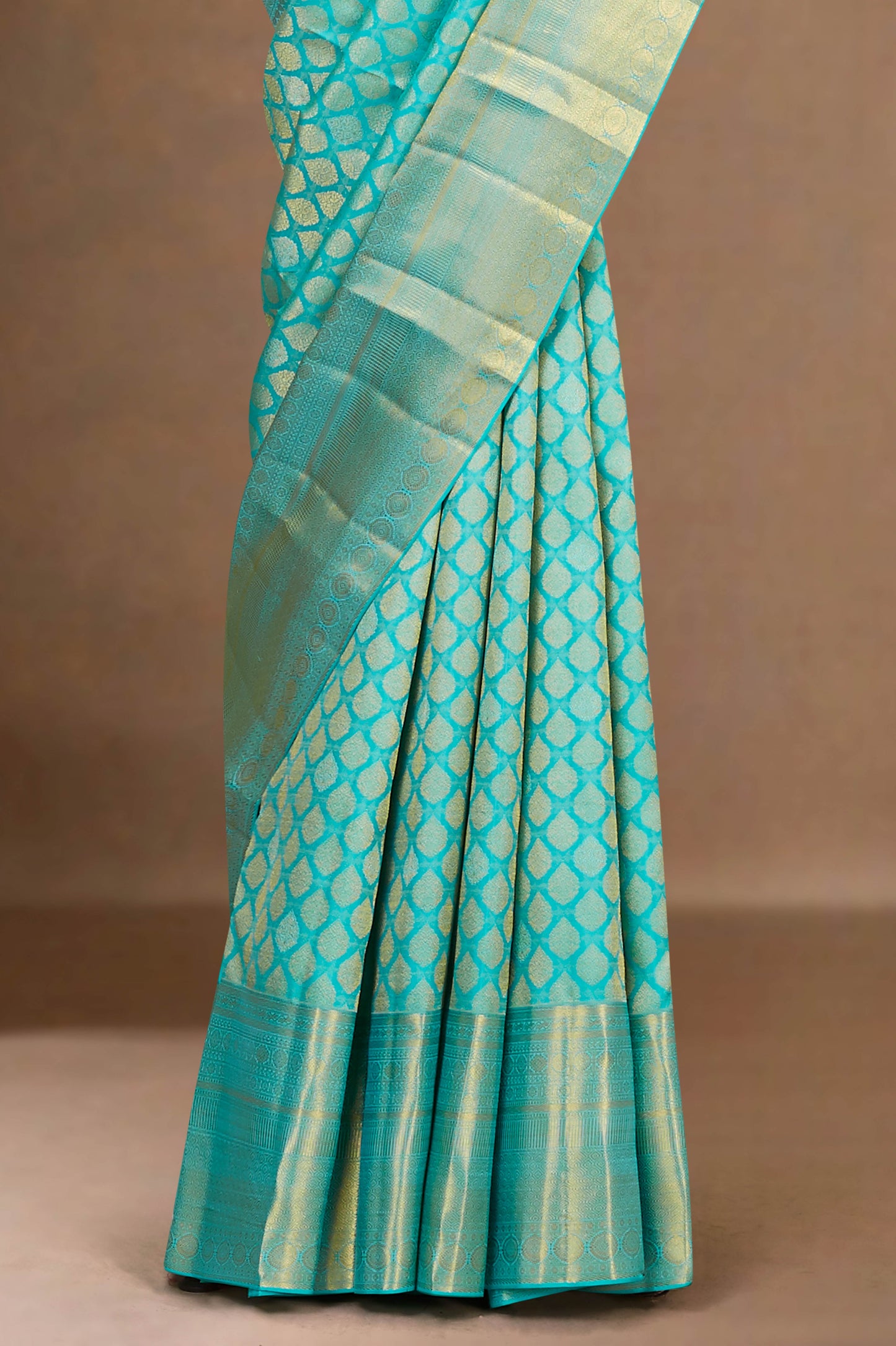 Turquoise silk saree with zari border