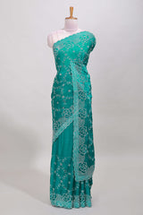 Turquoise stonework saree