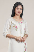Off white cotton straight kurti floral embroidery design with 3/4 slevee and florentine neck