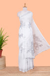 White linen cotton saree with floral motifs
