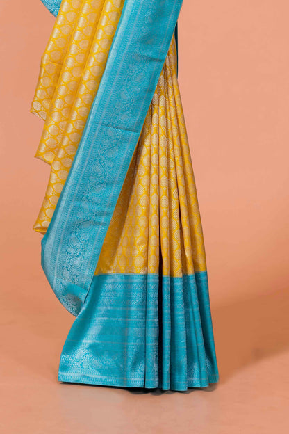 Yellow silk saree with zari border
