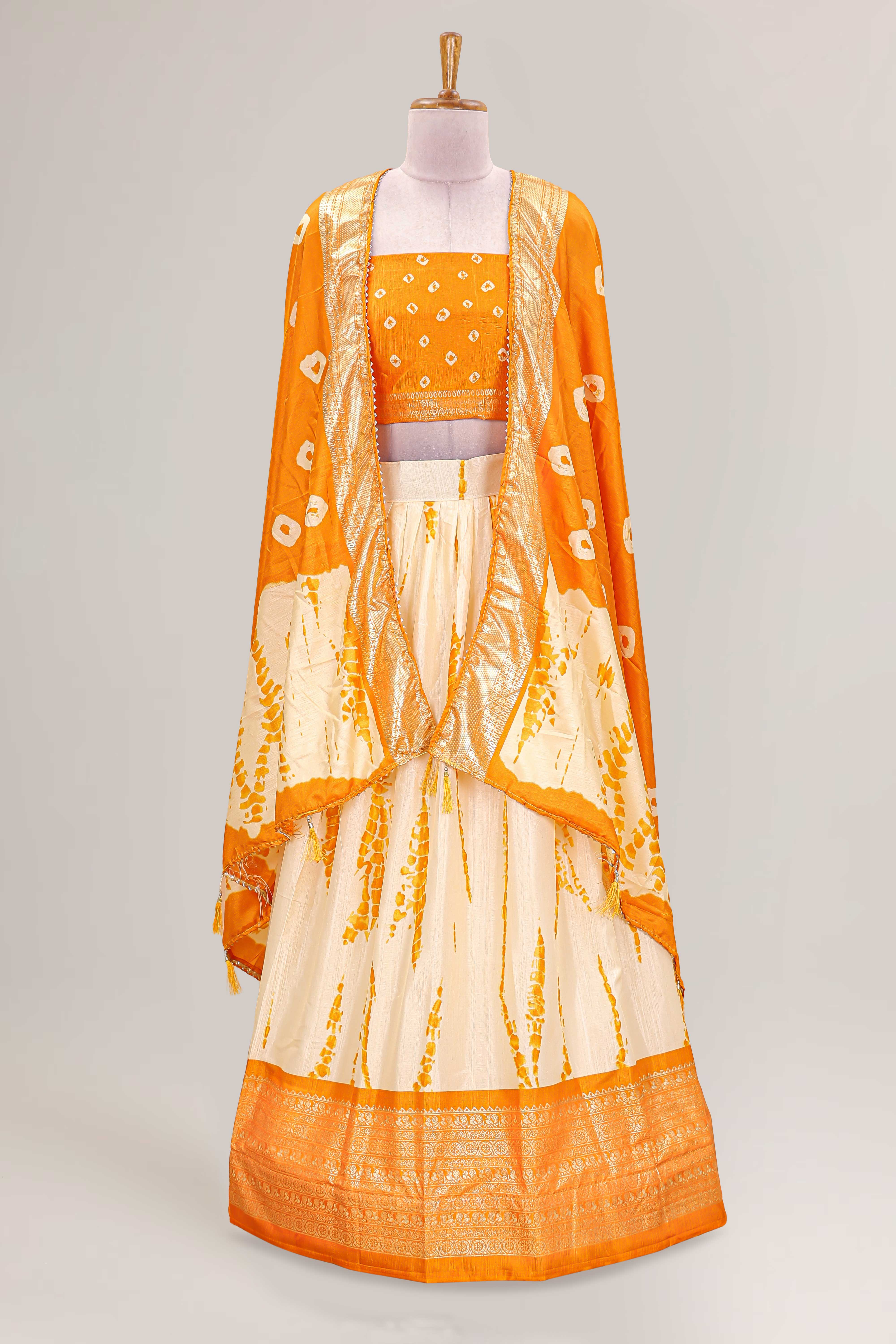 cream lehenga dhavani set