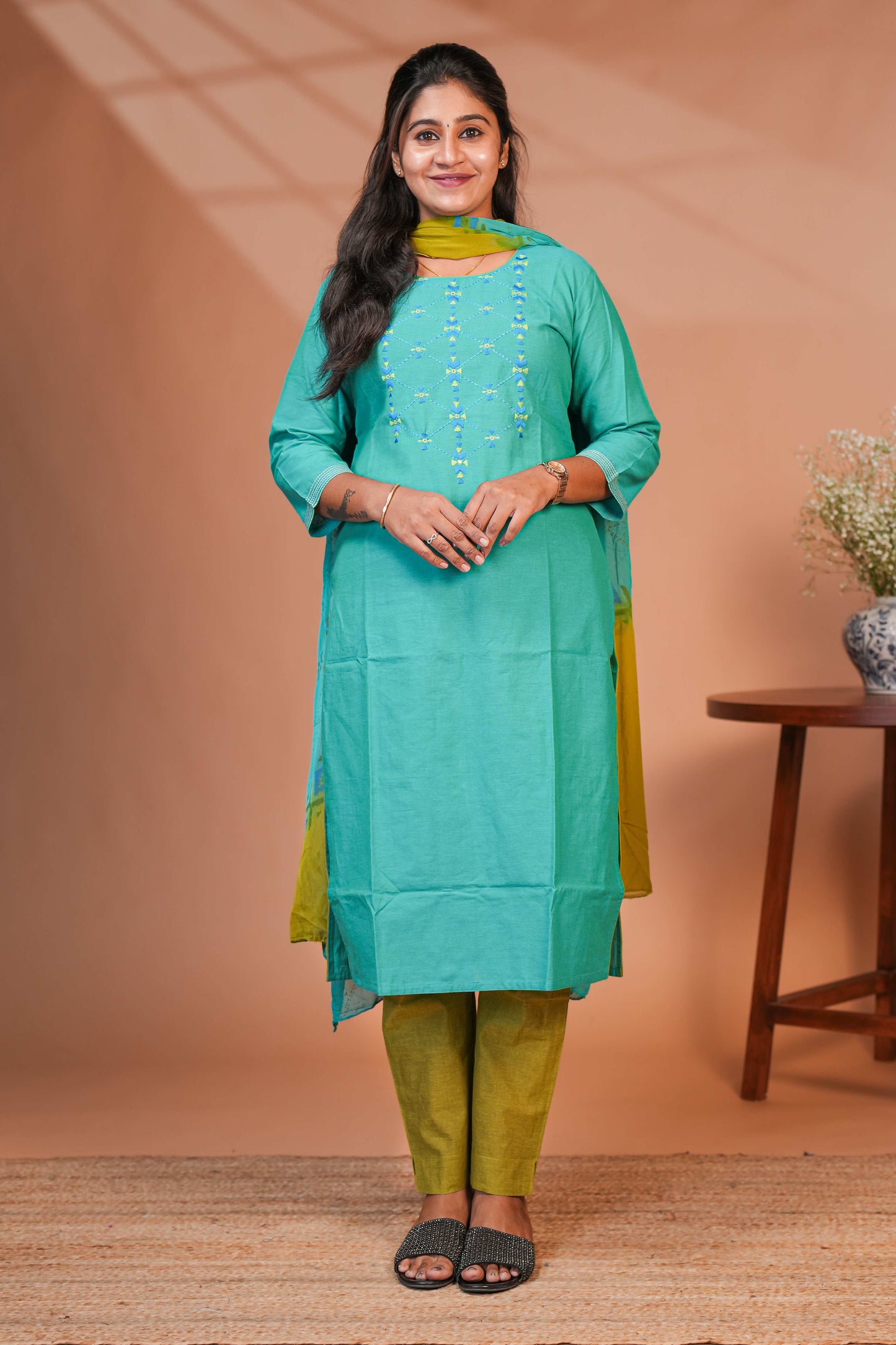 Green embroidery geometric design round neck salwar set with 3/4th sleeve, self bottom and matching dupatta