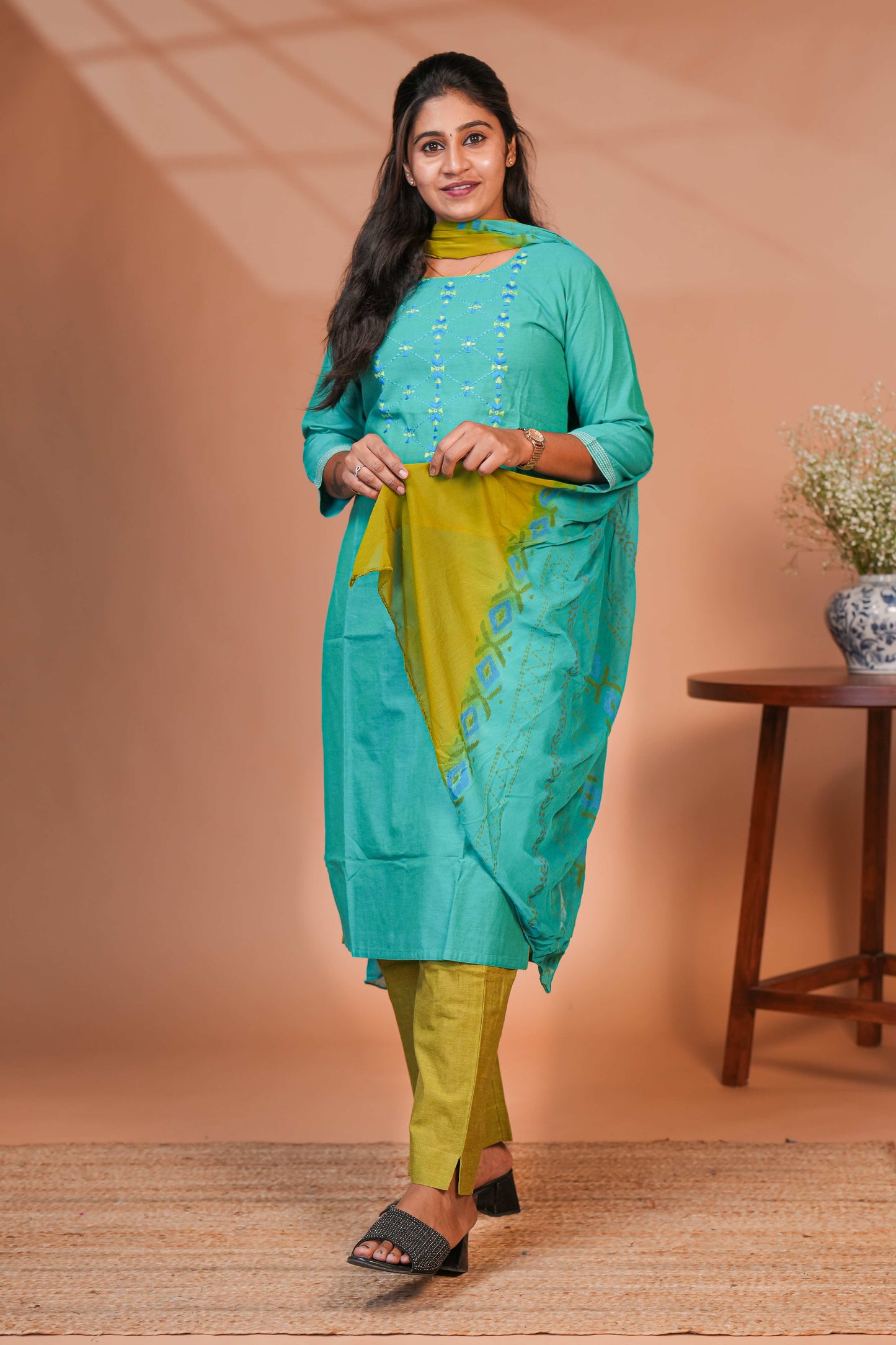 Green embroidery geometric design round neck salwar set with 3/4th sleeve, self bottom and matching dupatta