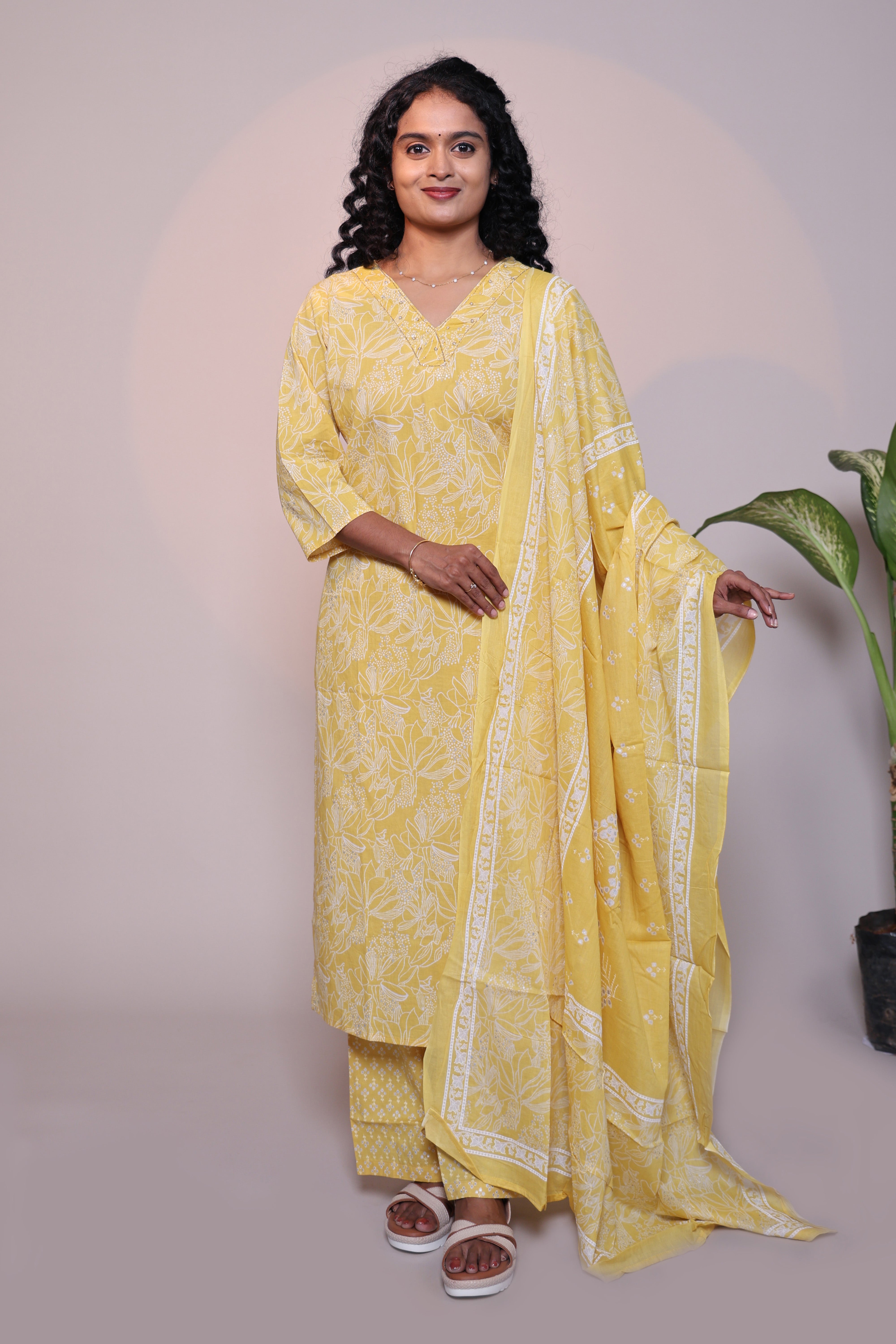 Yellow floral design 3/4 slevee salwar suit with matching pant and floral printed dupatta
