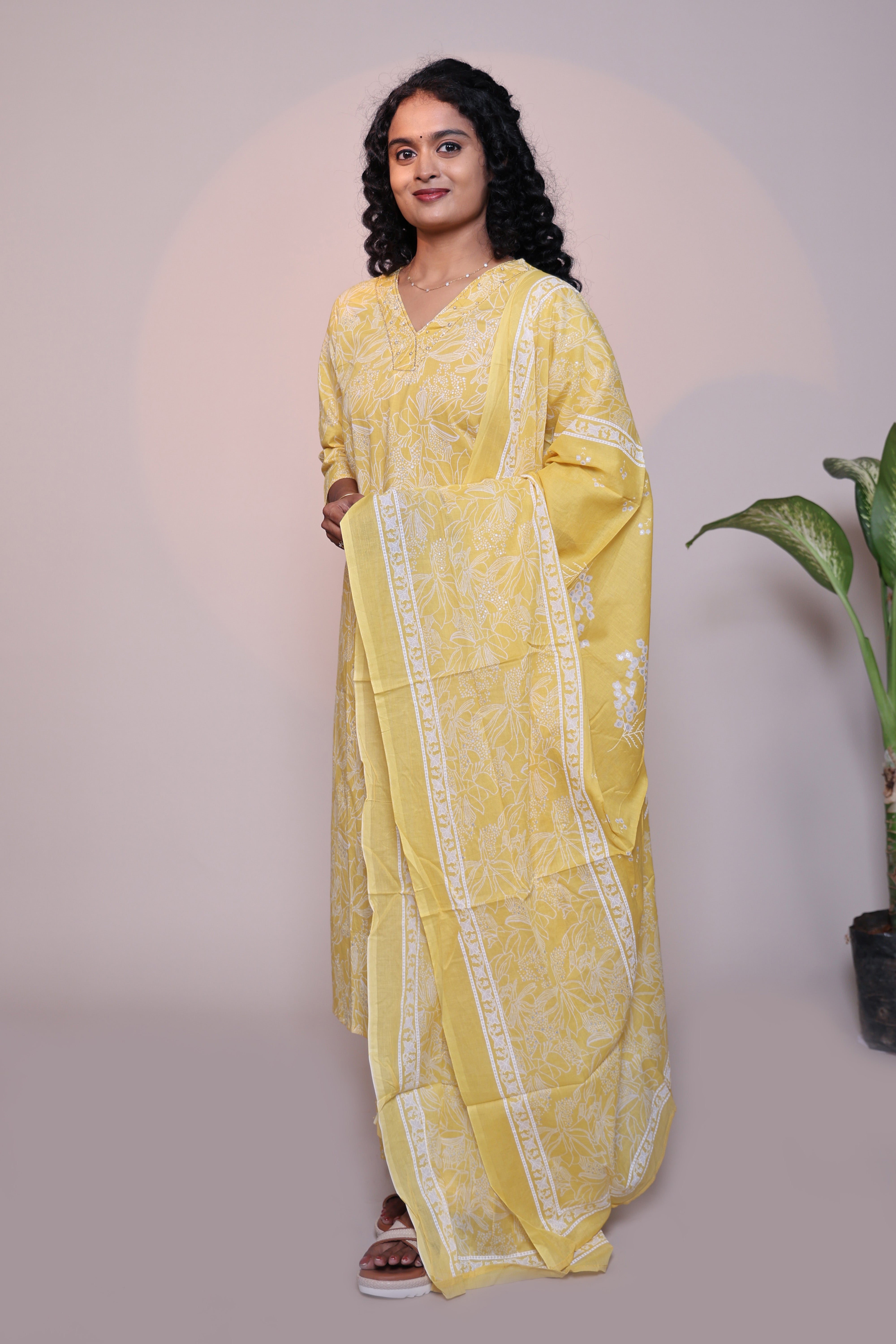Yellow floral design 3/4 slevee salwar suit with matching pant and floral printed dupatta