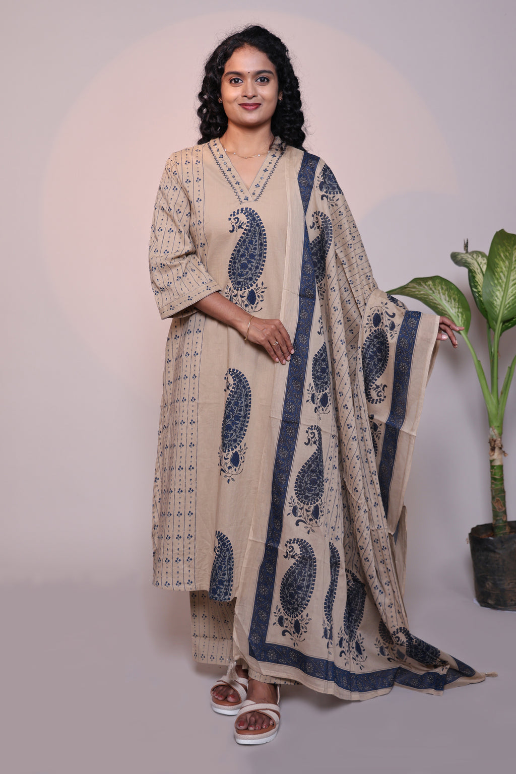 Light brown floral motifs 3/4 slevee salwar suit with matching pant and printed dupatta
