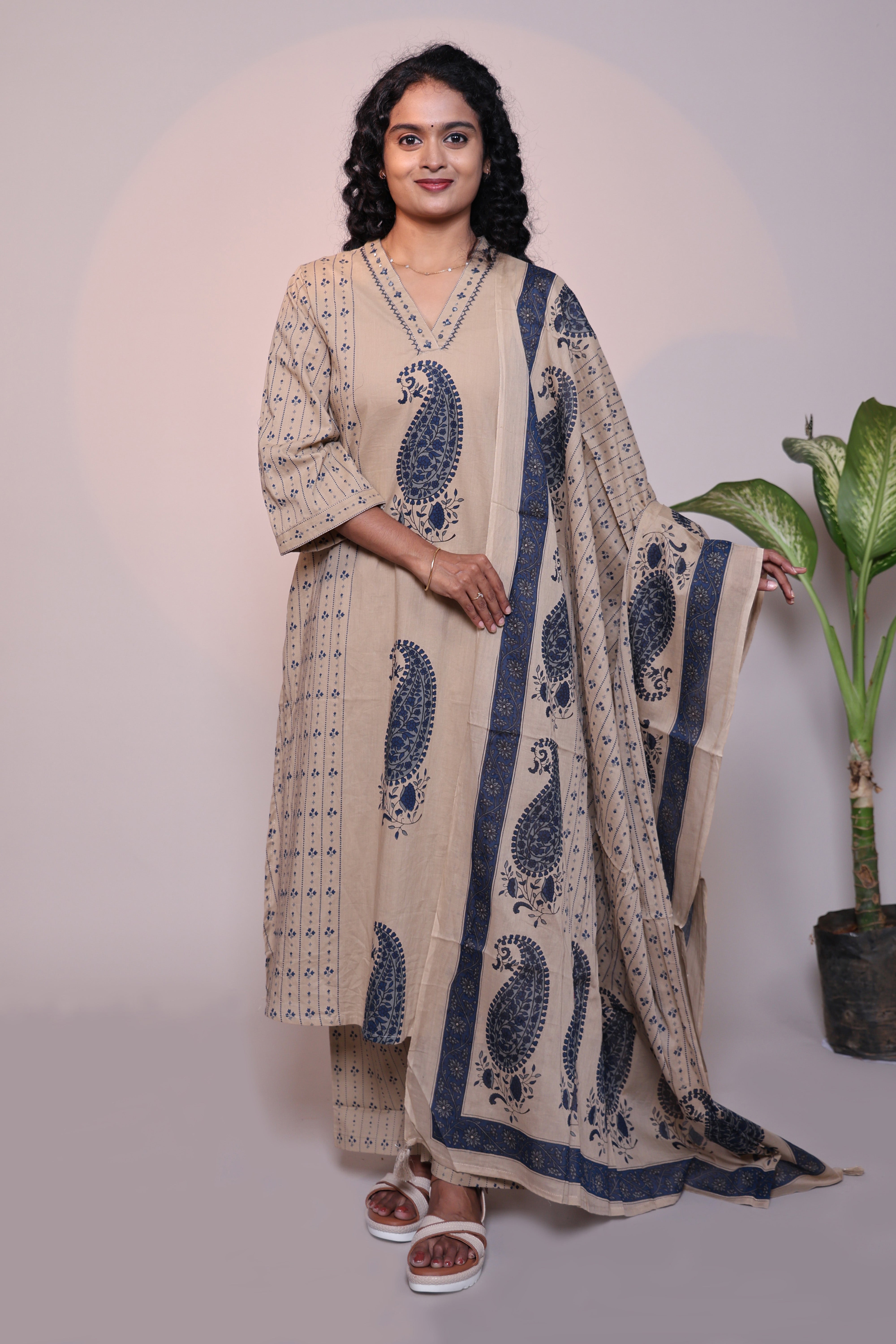 Light brown floral motifs 3/4 slevee salwar suit with matching pant and printed dupatta