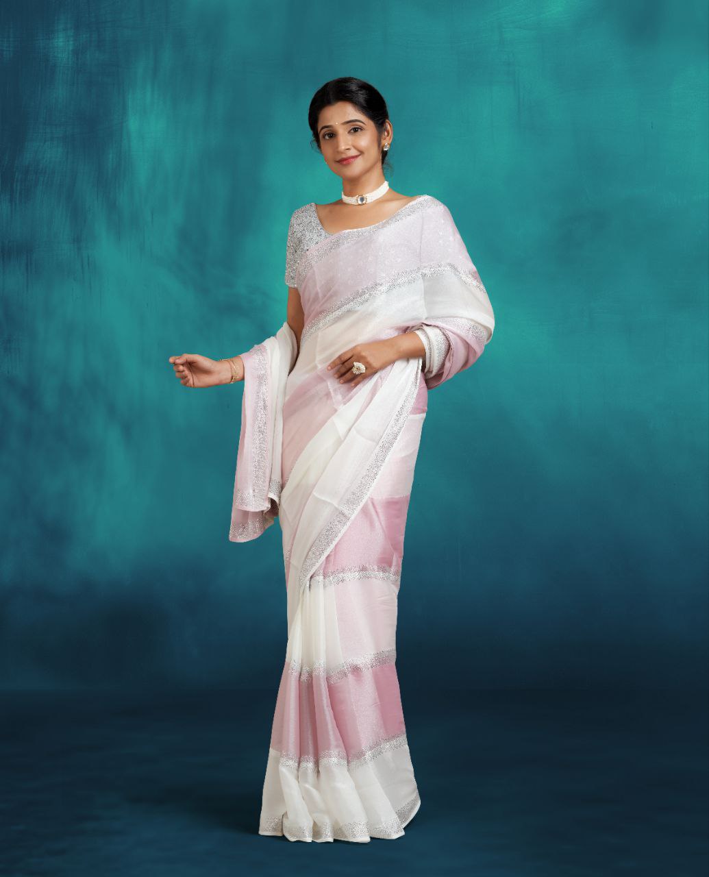 White and light pink color light weight saree with stonework