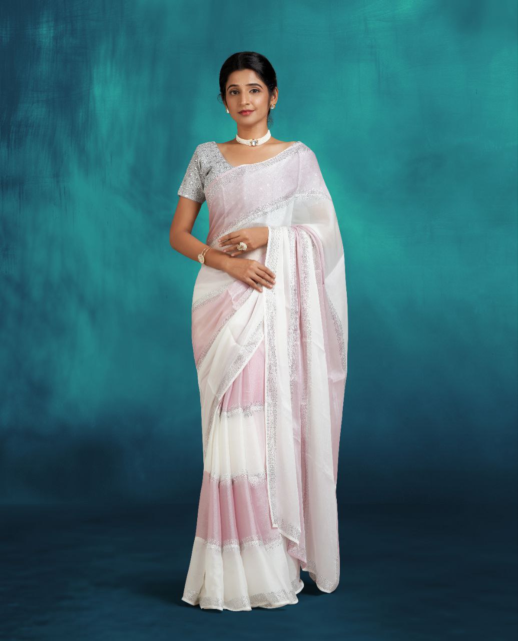 White and light pink color light weight saree with stonework